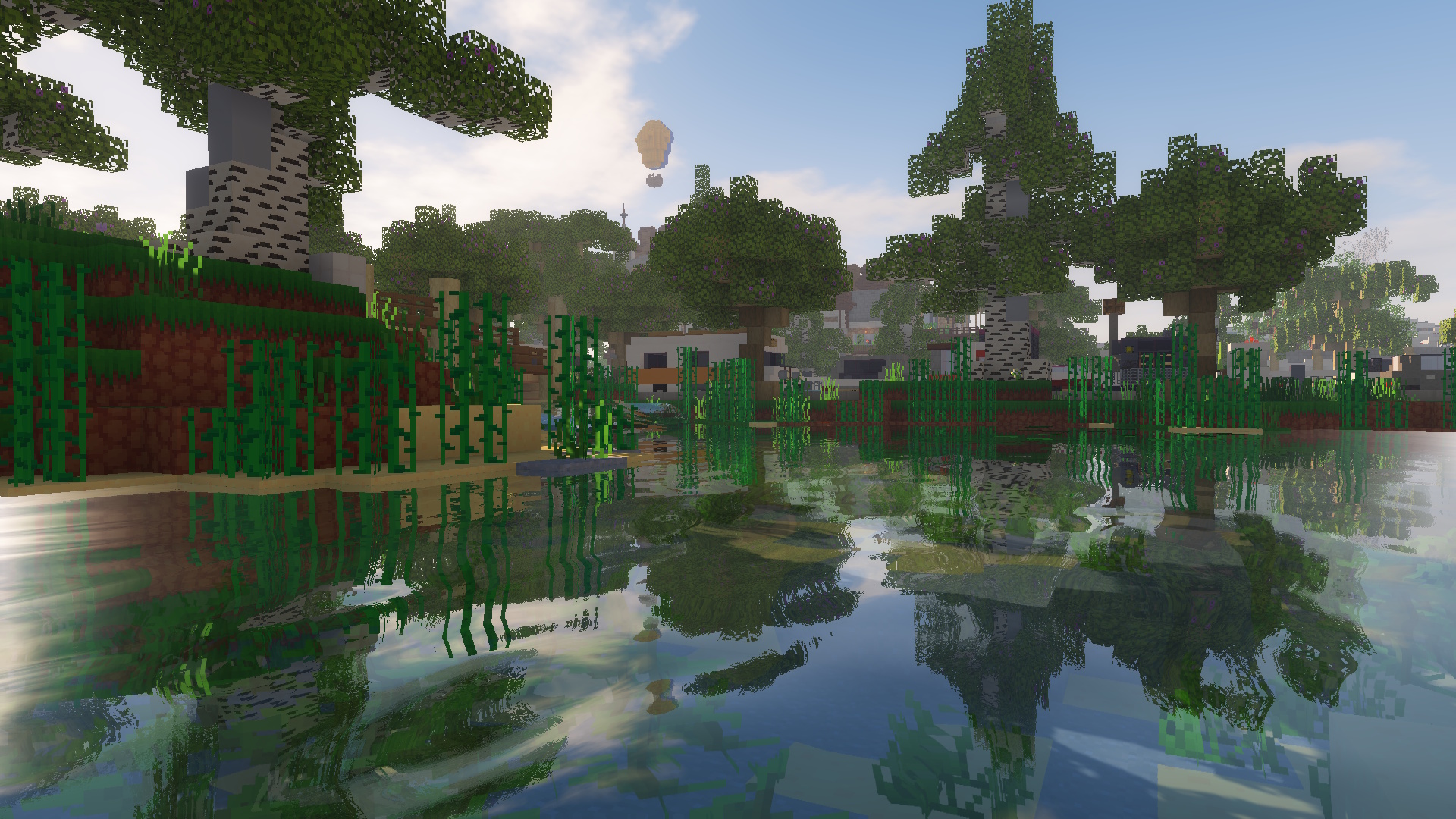 A screenshot within Minecraft of a pond surrounded by some trees. The area in which the screenshot was taken is from the Gameshow Showdown project.